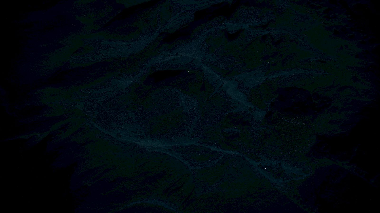 The image is very dark and unclear, making it difficult to identify specific details or objects within it.